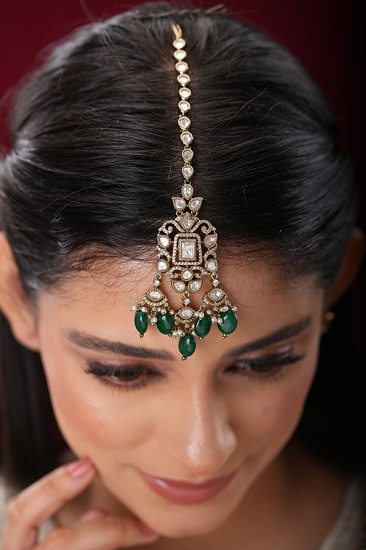 Gold Finish Kundan Polki & Green Stone Maangtikka by EKATHVA JAIPUR at Pernia's Pop Up Shop