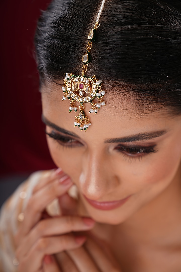 Gold Finish Kundan Polki & Green Stone Maangtikka by EKATHVA JAIPUR at Pernia's Pop Up Shop