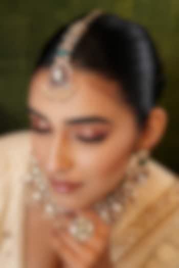 Gold Finish Kundan Polki & Green Stone Maangtikka by EKATHVA JAIPUR at Pernia's Pop Up Shop