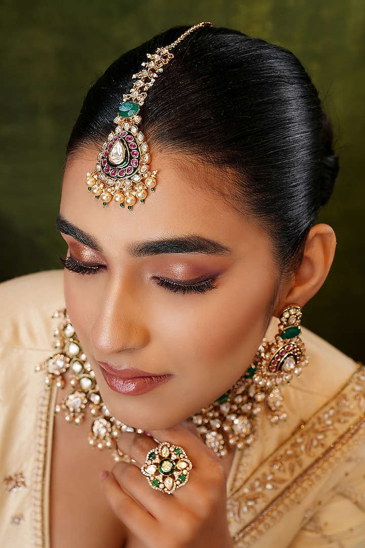 Gold Finish Kundan Polki & Green Stone Maangtikka by EKATHVA JAIPUR at Pernia's Pop Up Shop