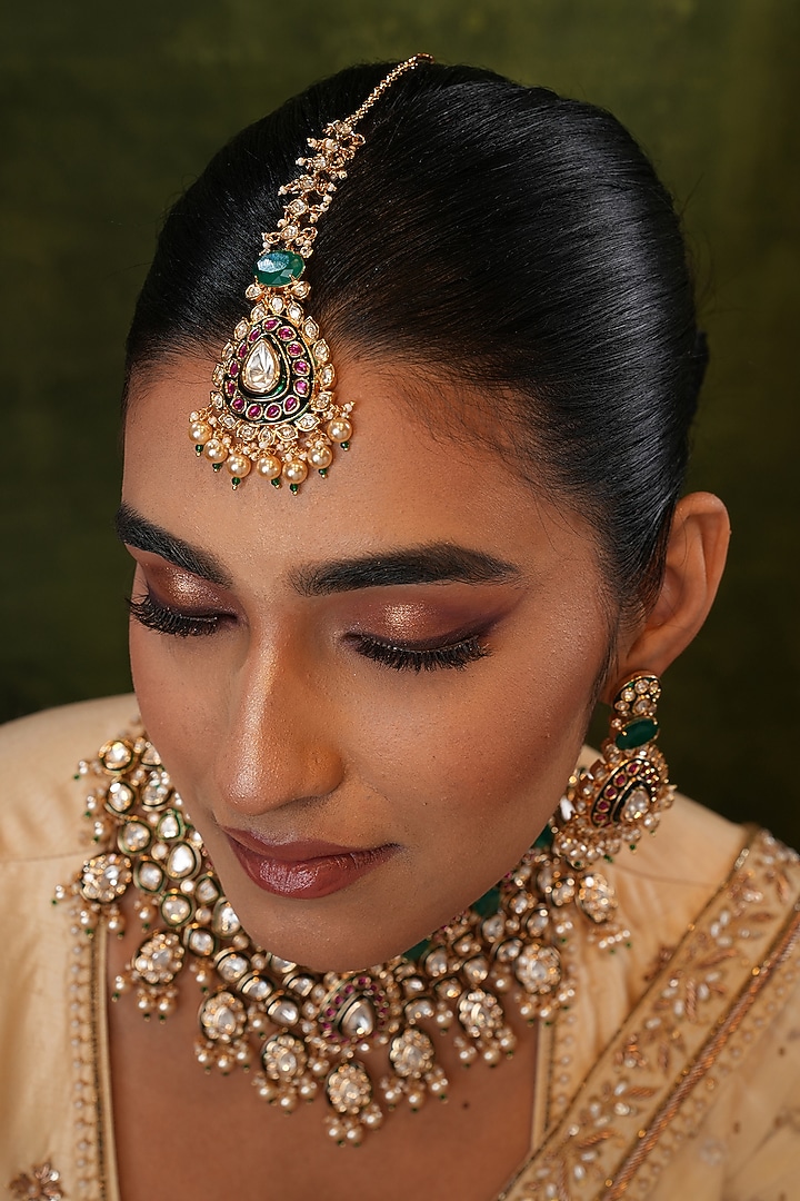 Gold Finish Kundan Polki & Green Stone Maangtikka by EKATHVA JAIPUR at Pernia's Pop Up Shop