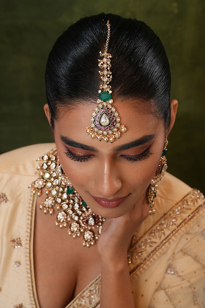 Gold Finish Kundan Polki & Green Stone Maangtikka by EKATHVA JAIPUR at Pernia's Pop Up Shop