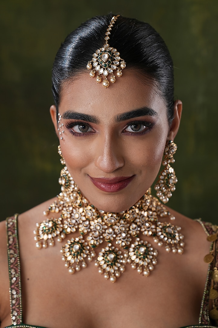 Gold Finish Kundan Polki & Green Stone Maangtikka by EKATHVA JAIPUR at Pernia's Pop Up Shop