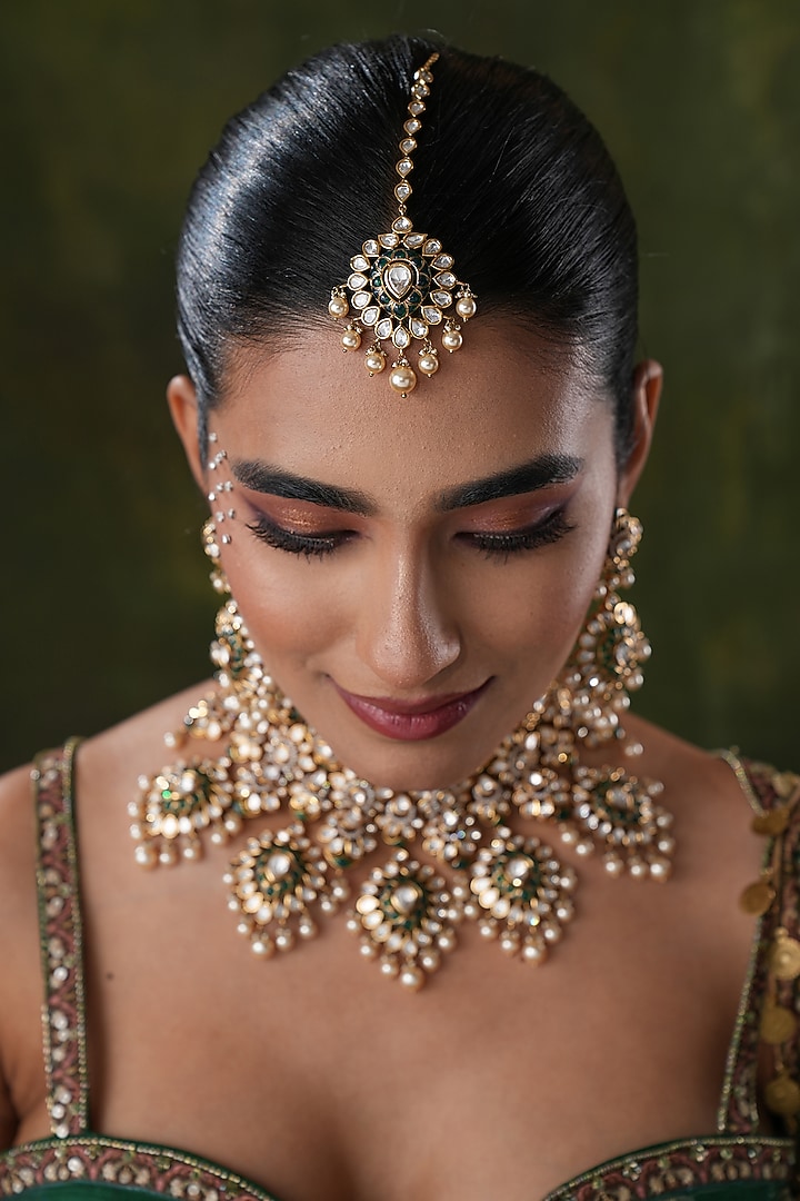 Gold Finish Kundan Polki & Green Stone Maangtikka by EKATHVA JAIPUR at Pernia's Pop Up Shop