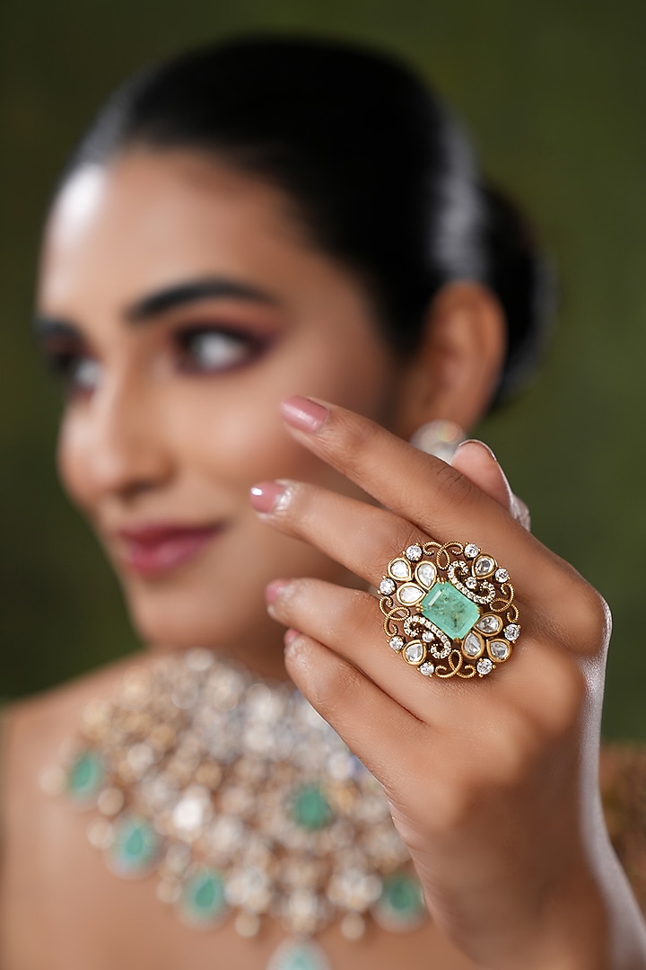 Gold Finish Kundan Polki & Mint Stone Ring by EKATHVA JAIPUR at Pernia's Pop Up Shop