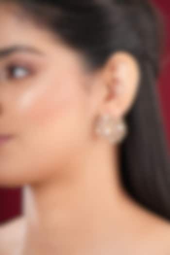 Gold Finish Kundan Polki Stud Earrings by EKATHVA JAIPUR at Pernia's Pop Up Shop