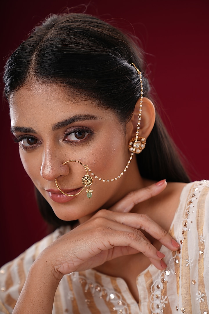 Gold Finish Kundan Polki & Green Stone Nath by EKATHVA JAIPUR at Pernia's Pop Up Shop