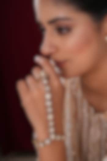 Gold Finish Kundan Polki & Pearl Hathphools (Set Of 2) by EKATHVA JAIPUR at Pernia's Pop Up Shop