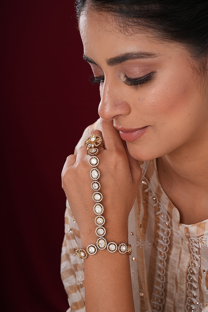 Gold Finish Kundan Polki & Pearl Hathphools (Set Of 2) by EKATHVA JAIPUR at Pernia's Pop Up Shop