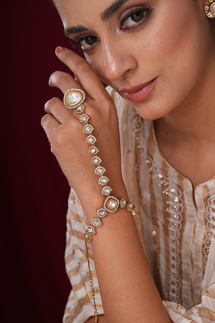 Gold Finish Kundan Polki & Pearl Hathphools (Set Of 2) by EKATHVA JAIPUR at Pernia's Pop Up Shop