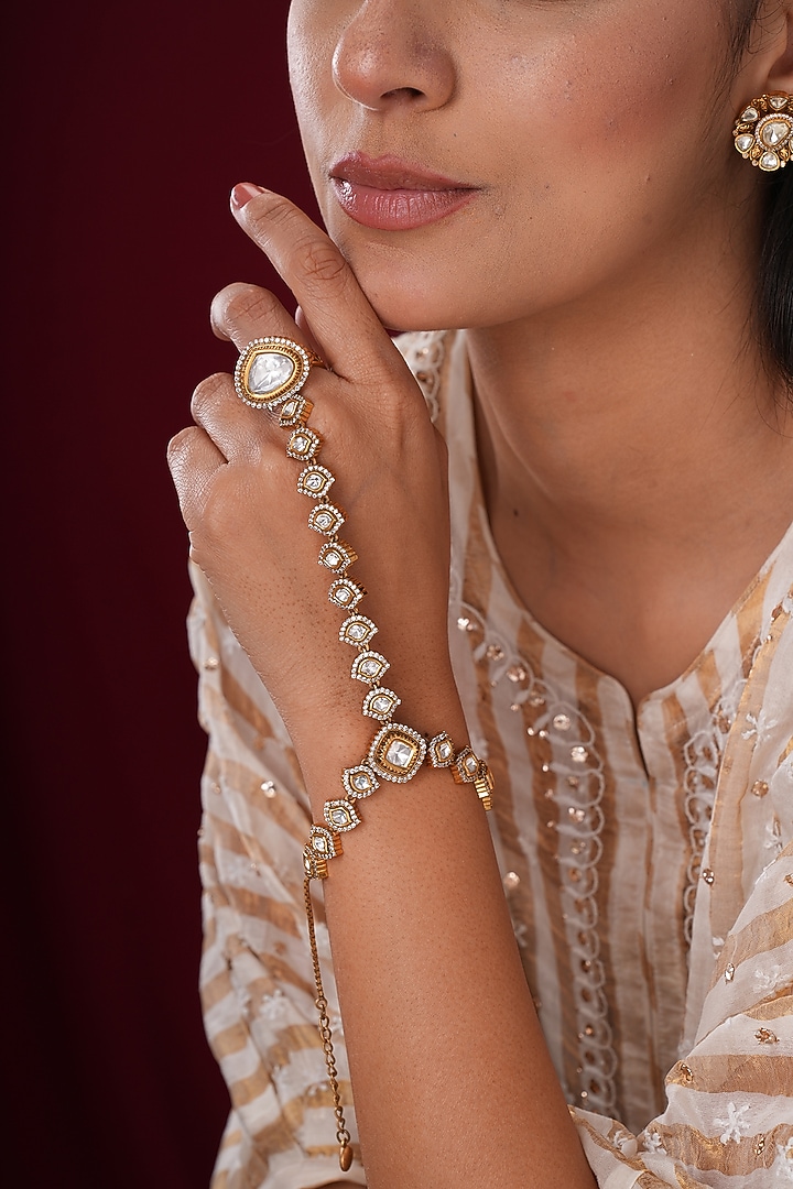 Gold Finish Kundan Polki & Pearl Hathphools (Set Of 2) by EKATHVA JAIPUR at Pernia's Pop Up Shop