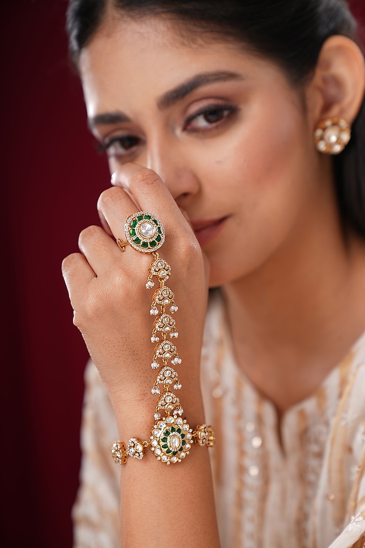 Gold Finish Kundan Polki & Shell Pearl Hathphools (Set Of 2) by EKATHVA JAIPUR at Pernia's Pop Up Shop