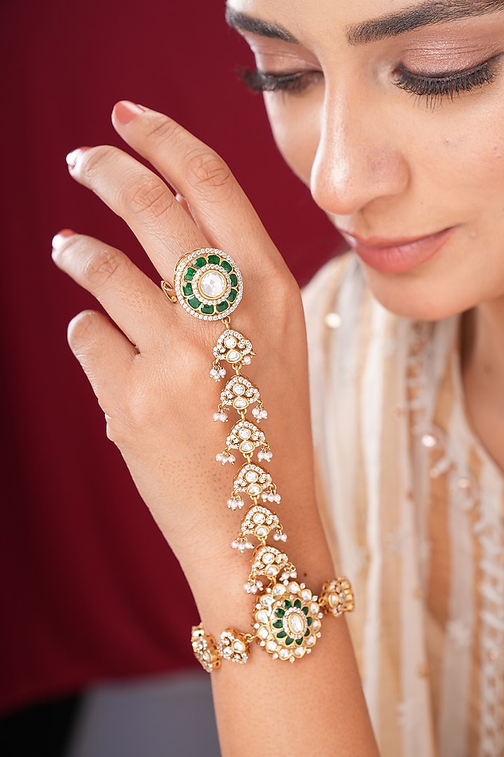 Gold Finish Kundan Polki & Shell Pearl Hathphools (Set Of 2) by EKATHVA JAIPUR at Pernia's Pop Up Shop