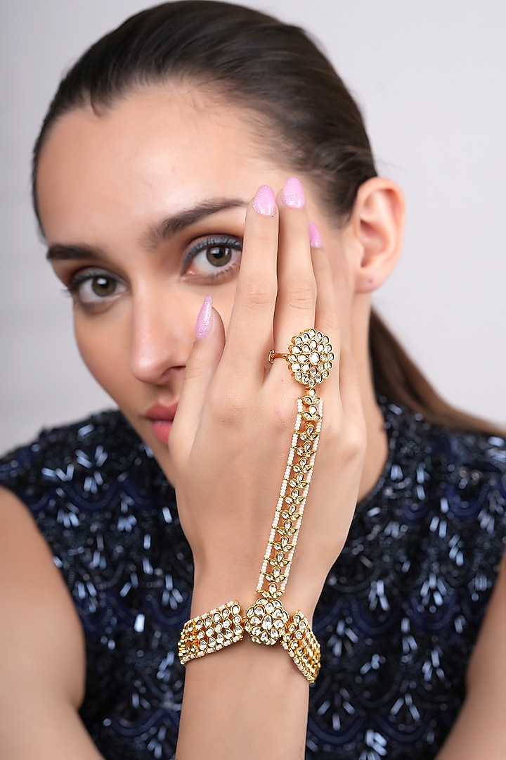 Gold Plated Kundan Polki Hathphools (Set of 2) by EKATHVA JAIPUR at Pernia's Pop Up Shop