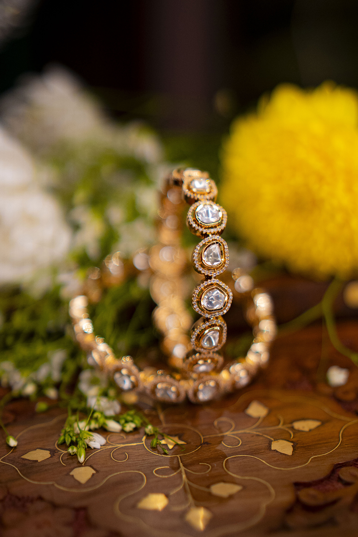 Gold Finish Uncut Polki & Cubic Zirconia Bangles (Set Of 2) by EKATHVA JAIPUR at Pernia's Pop Up Shop
