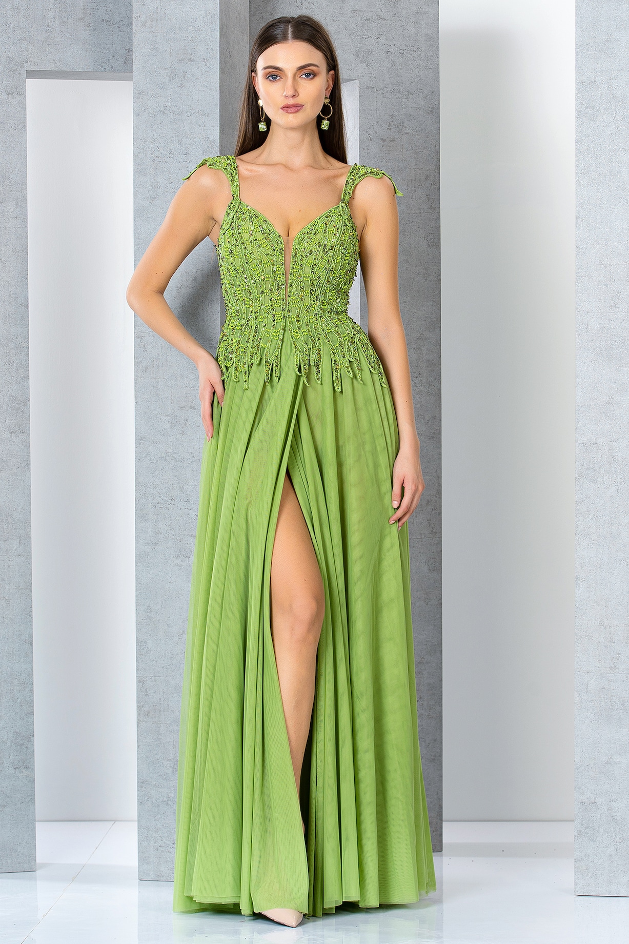 Pistachio Green Net & Tulle Sequins Embroidered Flared Gown by Eli Bitton  at Pernia's Pop Up Shop 2026
