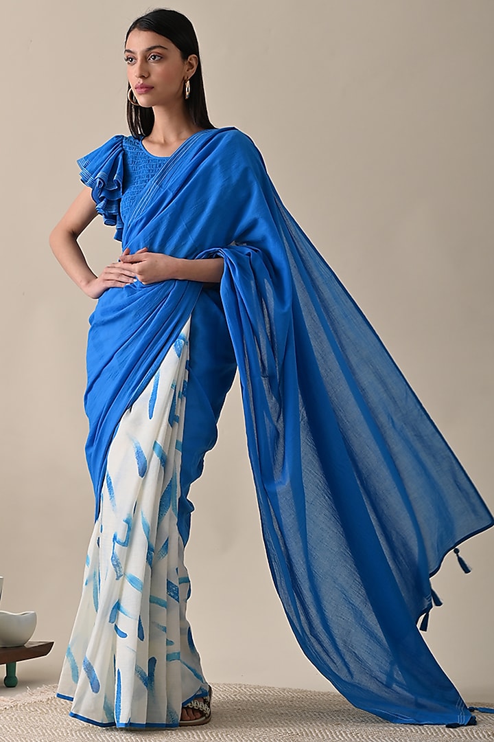 Blue Malmal Hald & Half Printed Saree
 by Kanelle