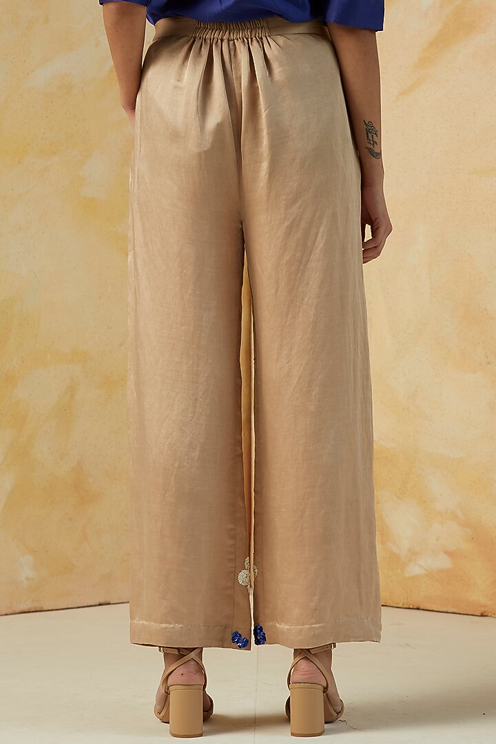 Beige Floral Embroidered Trousers by Kanelle at Pernia's Pop Up Shop