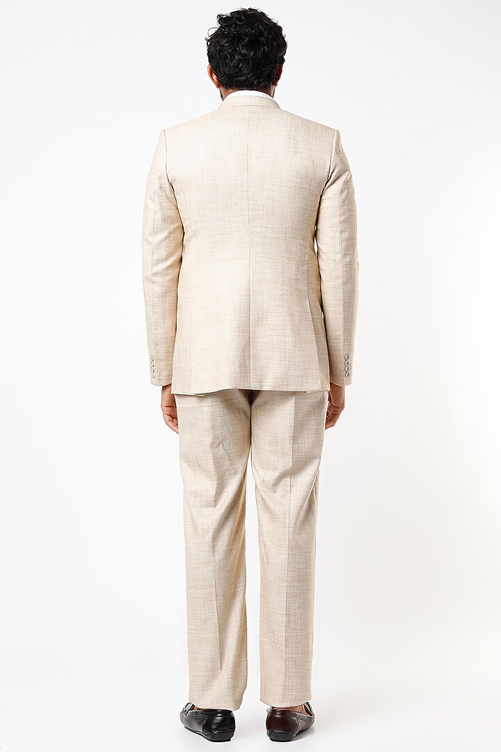 Beige Textured Blazer Set by Emblaze Men at Pernia's Pop Up Shop