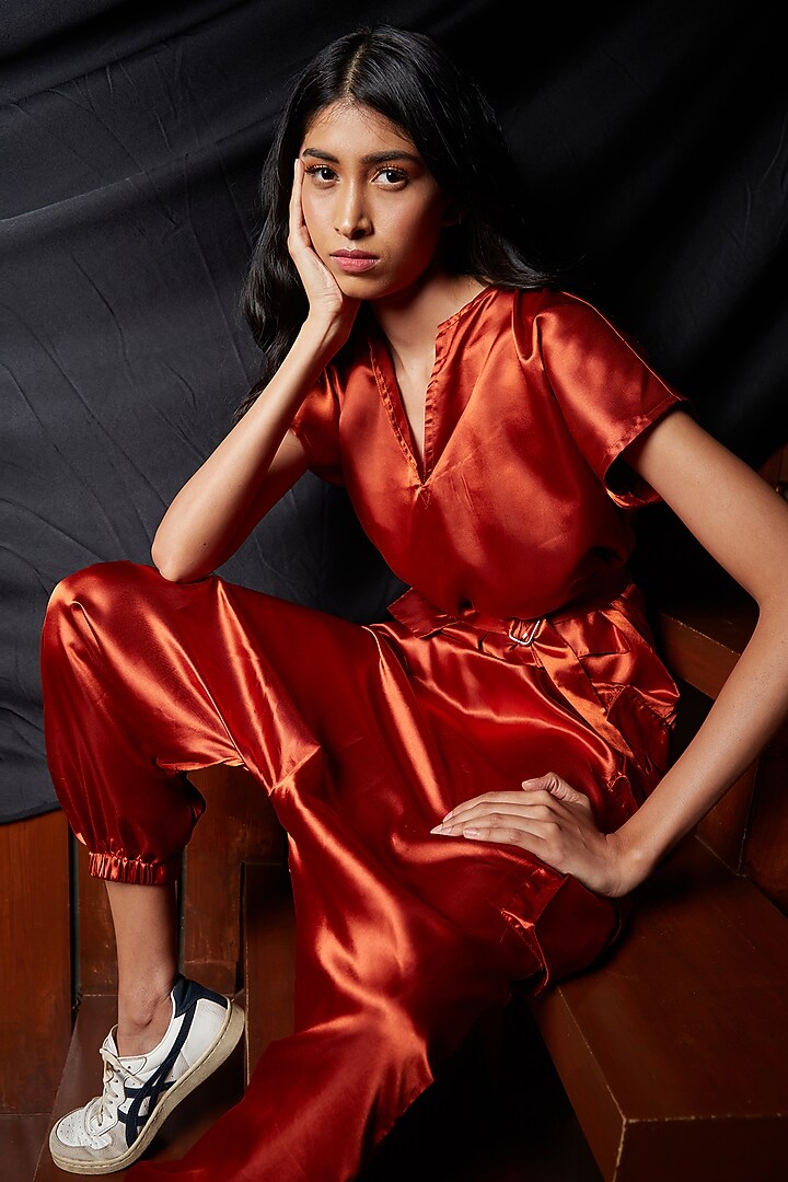 Rust Low Crotch Jumpsuit With Belt by Emblaze at Pernia's Pop Up Shop