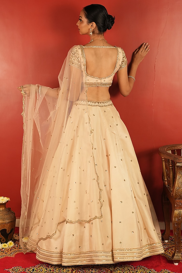 Ivory Upada Silk Embroidered Wedding Lehenga Set by EnamourByRadha at Pernia's Pop Up Shop