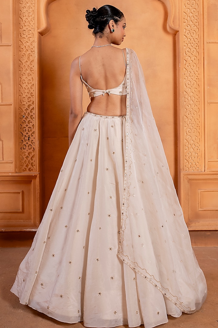 White Zari Silk Pearl & Sequins Embroidered Wedding Lehenga Set by EnamourByRadha at Pernia's Pop Up Shop