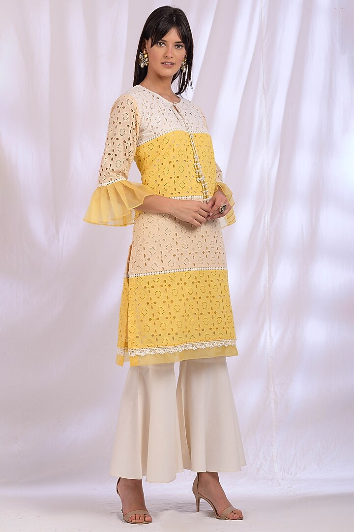 Butter Yellow Kurta Set With Lace Detailing by Enaarah at Pernia's Pop Up Shop