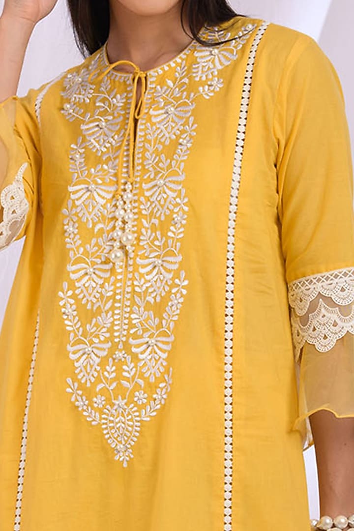Yellow Floral Embroidered Kurta Set by Enaarah at Pernia's Pop Up Shop
