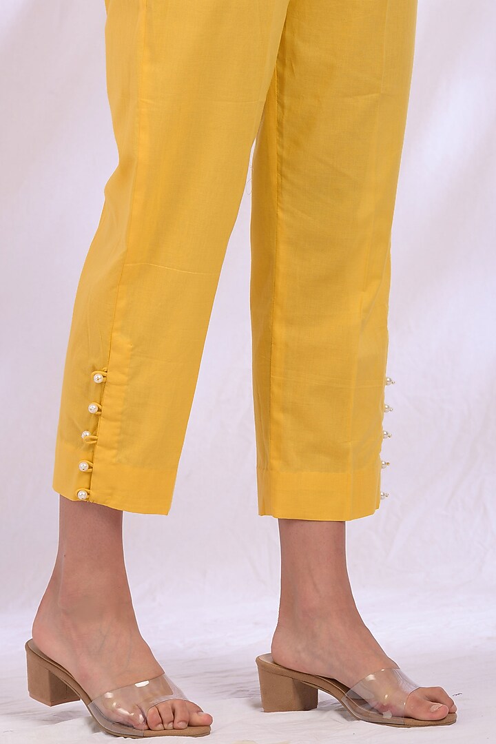 Yellow Floral Embroidered Kurta Set by Enaarah at Pernia's Pop Up Shop