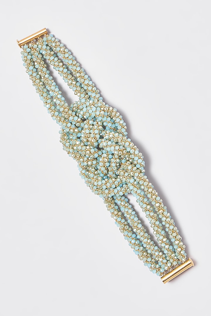 Gold Finish Blue Crystal & Zari Knotted Bracelet by ST ERASMUS at Pernia's Pop Up Shop