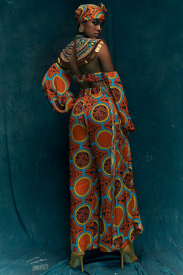 Orange Modal Satin D-ring Pants by Esha L Amin at Pernia's Pop Up Shop
