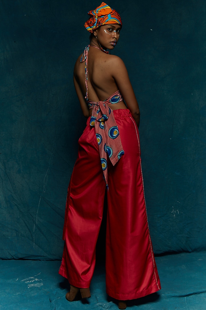 Red Suiting Flared Pants by Esha L Amin at Pernia's Pop Up Shop