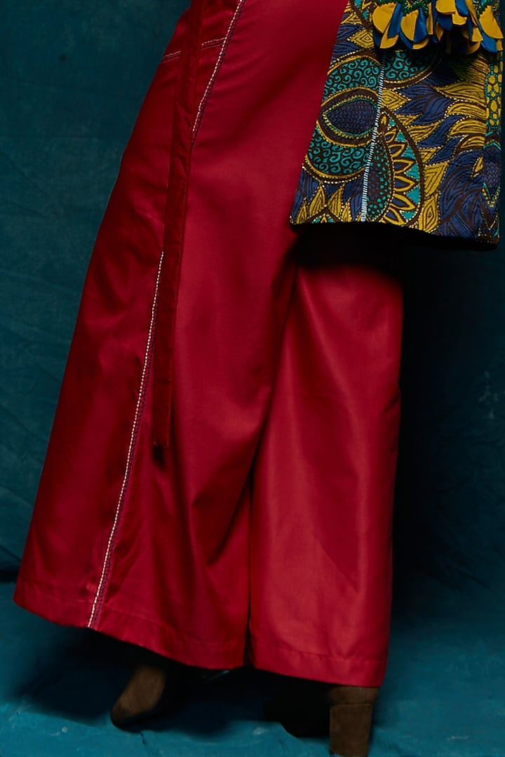 Red Suiting Flared Pants by Esha L Amin at Pernia's Pop Up Shop