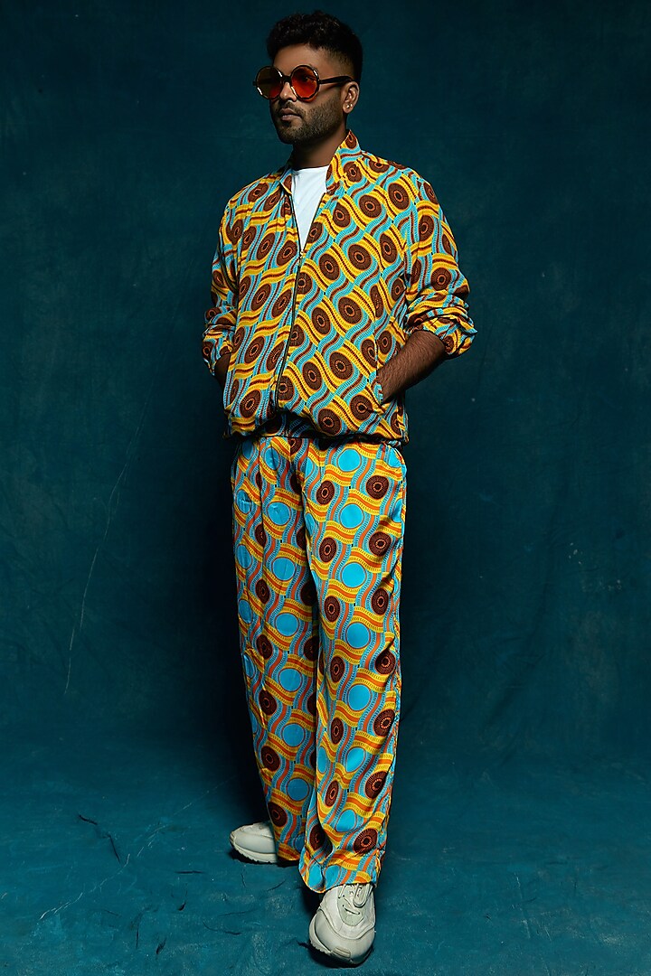 Turquoise Printed Pants by Eshaa Amiin Men