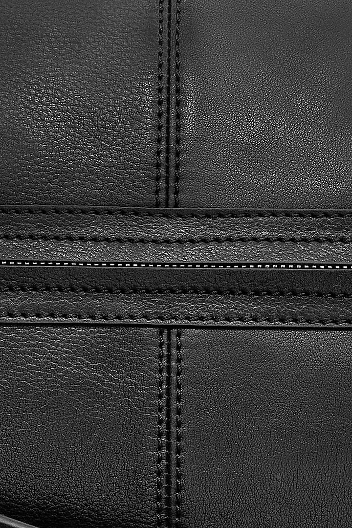 Black Leather Duffle Bag by ESKE at Pernia's Pop Up Shop