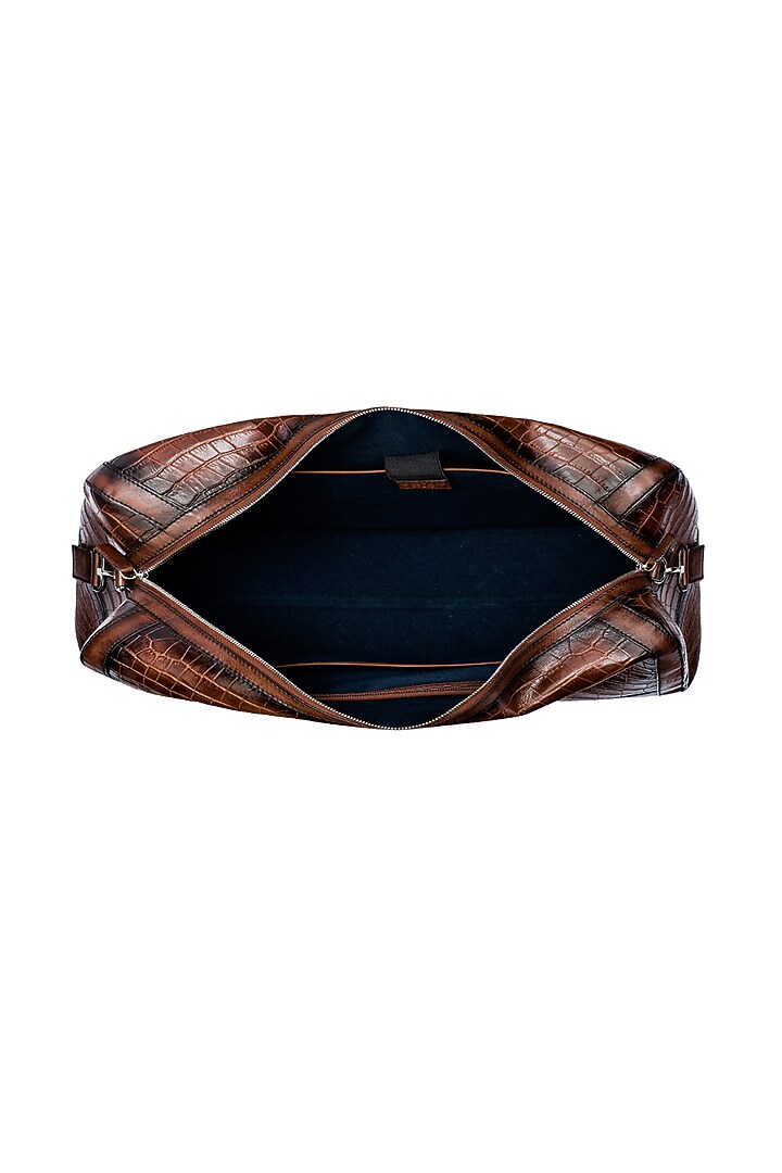 Tan Embossed Leather Duffle Bag by ESKE at Pernia's Pop Up Shop