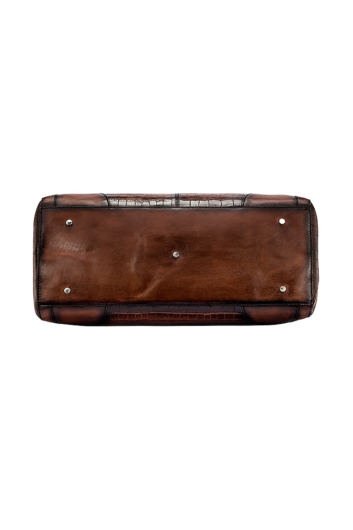 Tan Embossed Leather Duffle Bag by ESKE at Pernia's Pop Up Shop