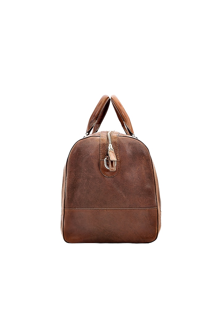 Tan Leather Duffle Bag by ESKE at Pernia's Pop Up Shop