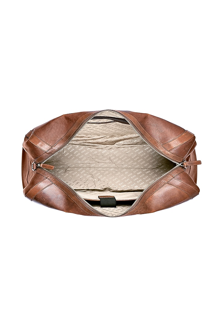 Tan Leather Duffle Bag by ESKE at Pernia's Pop Up Shop