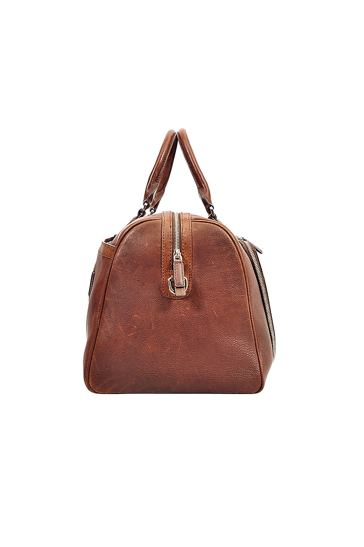 Tan Duffle Bag in Leather by ESKE at Pernia's Pop Up Shop