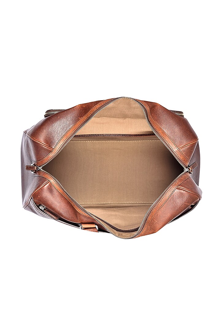 Tan Duffle Bag in Leather by ESKE at Pernia's Pop Up Shop