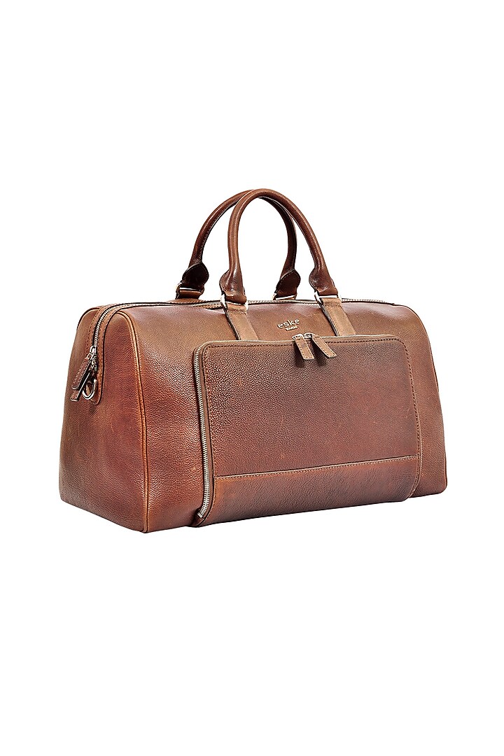 Tan Duffle Bag in Leather by ESKE at Pernia's Pop Up Shop