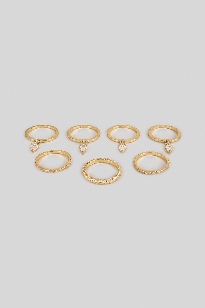 Gold Plated Pear-Cut Swarovski Crystal Rings (Set Of 7) by ESME at Pernia's Pop Up Shop