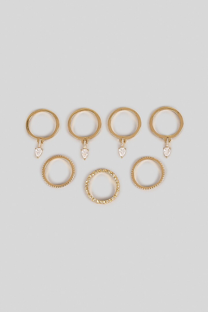 Gold Plated Pear-Cut Swarovski Crystal Rings (Set Of 7) by ESME at Pernia's Pop Up Shop