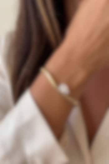 Gold Finish Pear-Shaped Austrian Crystal Bangle by ESME at Pernia's Pop Up Shop