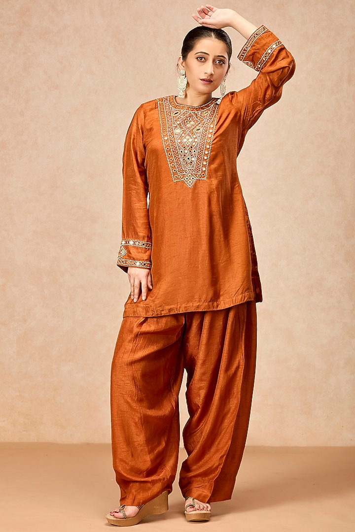 Rust Orange Dola Silk Mirror Embroidered Flared Kurta Set by ESSENCE by Nandini Thakkar at Pernia's Pop Up Shop