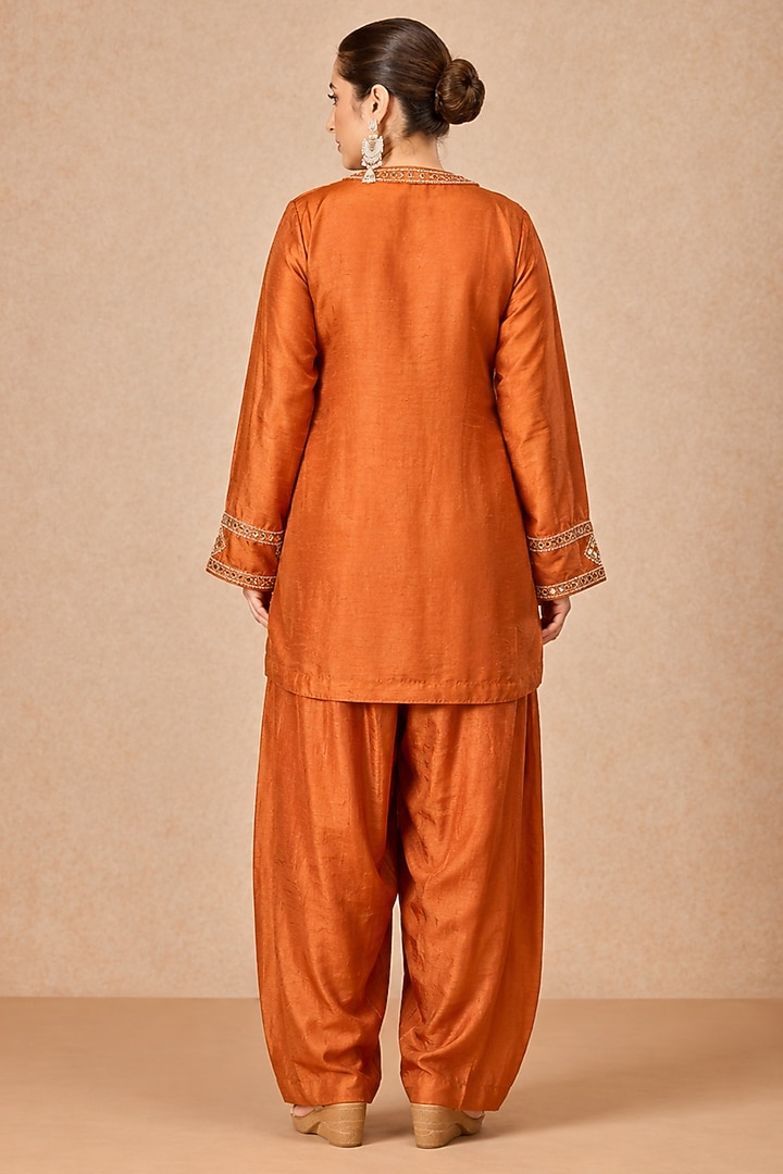 Rust Orange Dola Silk Mirror Embroidered Flared Kurta Set by ESSENCE by Nandini Thakkar at Pernia's Pop Up Shop