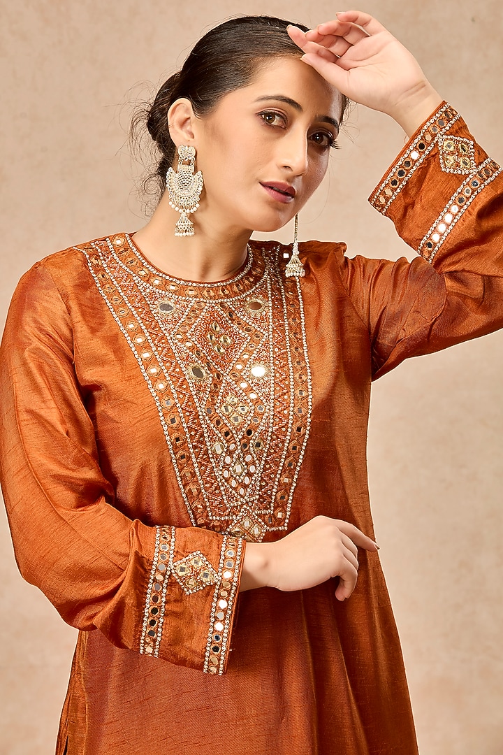 Rust Orange Dola Silk Mirror Embroidered Flared Kurta Set by ESSENCE by Nandini Thakkar at Pernia's Pop Up Shop
