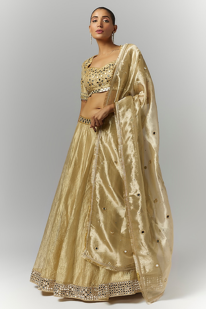 Gold Silk Crush Tissue Mirror Hand Embroidered Wedding Lehenga Set by Essay by Sumedha Agrawal at Pernia's Pop Up Shop