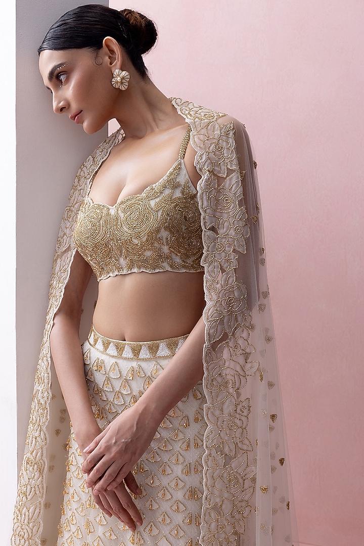 Ivory & Gold Tulle Applique & Crystal Work Bridal Lehenga Set by Esha Sethi Thirani at Pernia's Pop Up Shop